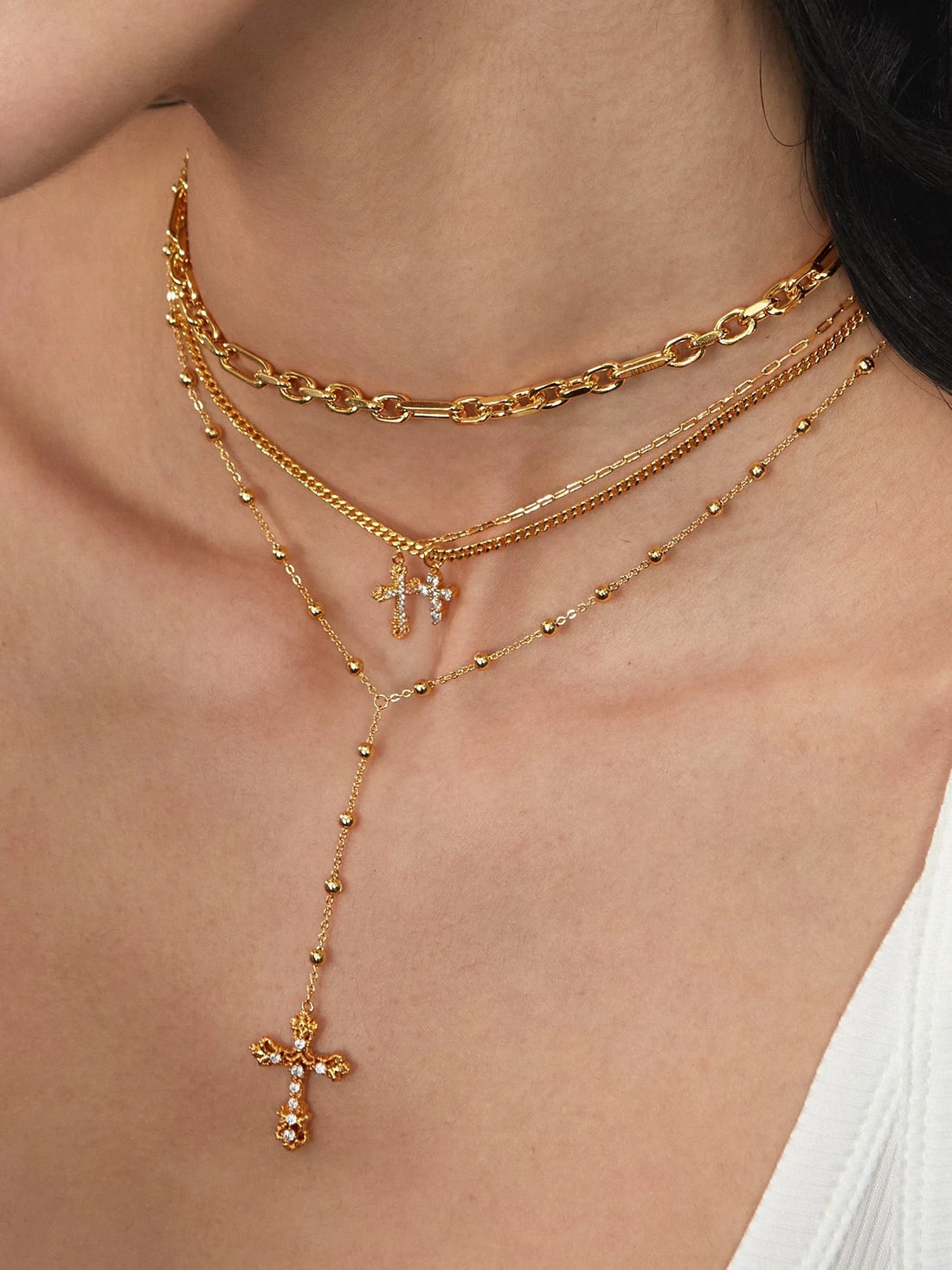 Gold necklace displayed for Lyastone cleaning and care guide