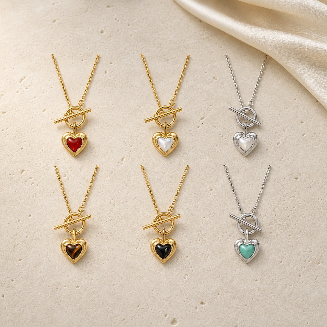 The Heart Within Necklace colour variants flat lay