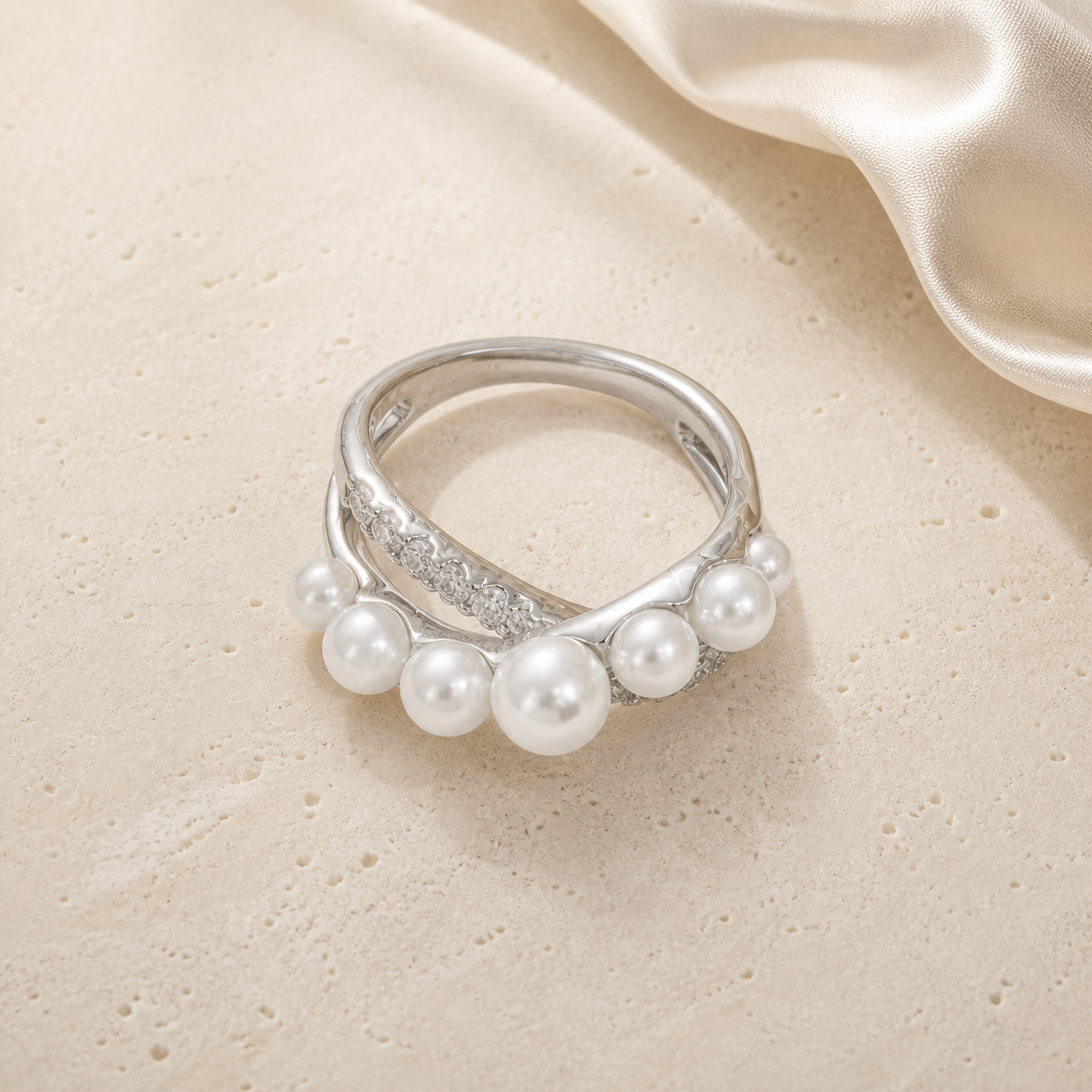 Planetary Pearl Ring silver crossover ring with graduated pearls