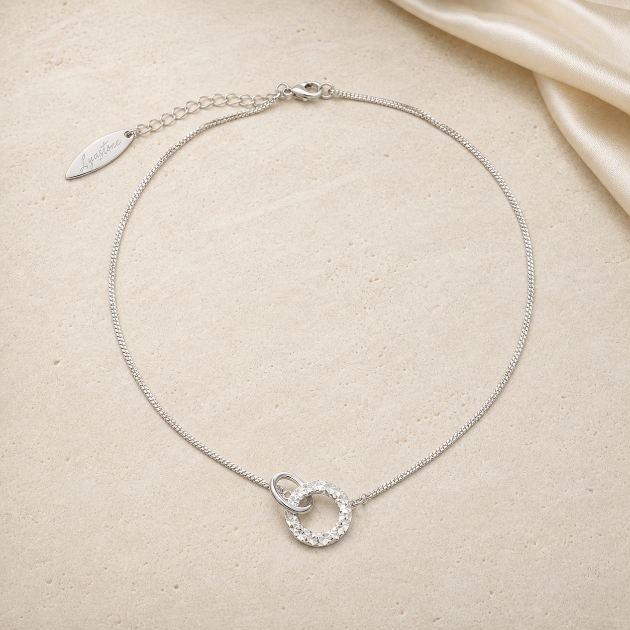 Orbit Duo Necklace silver textured double-ring pendant