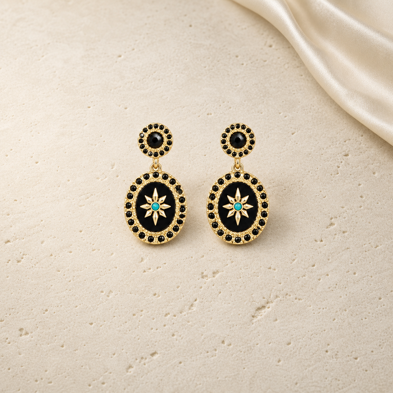 Vintage Black Mirror Medallion Drop Earrings on warm ivory travertine