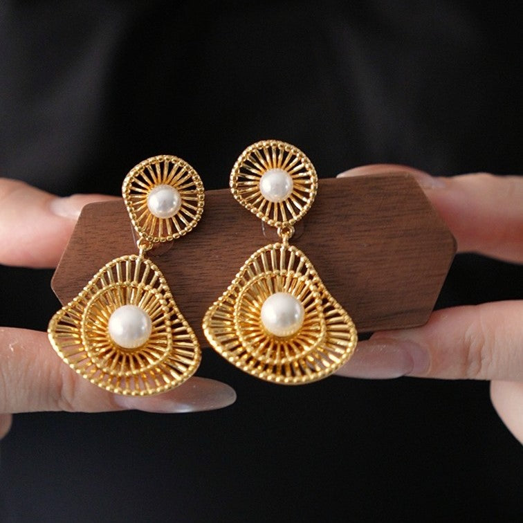 Gold hollow pearl statement earrings