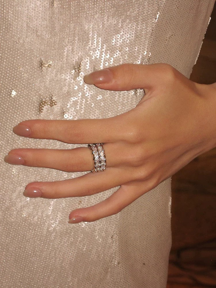 White gold serpentine zircon ring