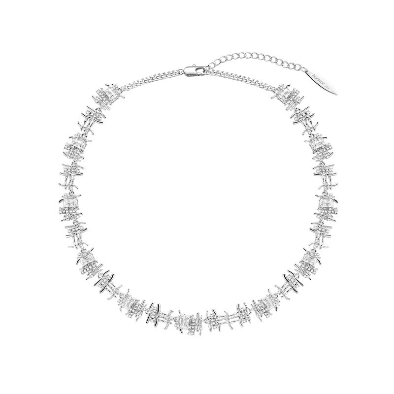 Gold tone woven collarbone necklace