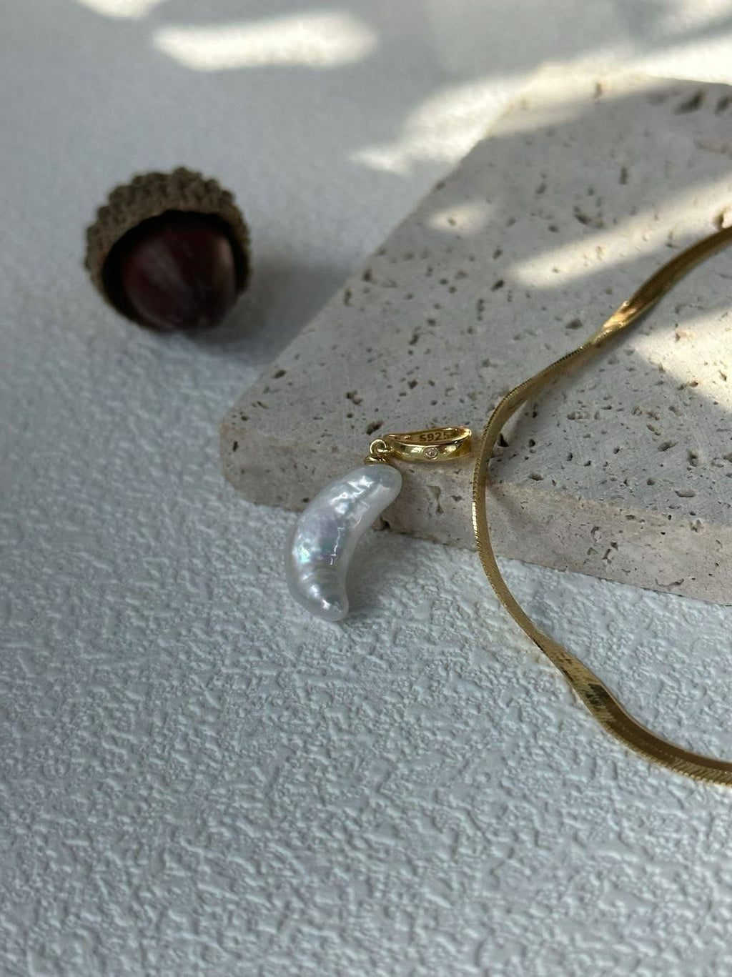 Herringbone chain necklace with moon pendant