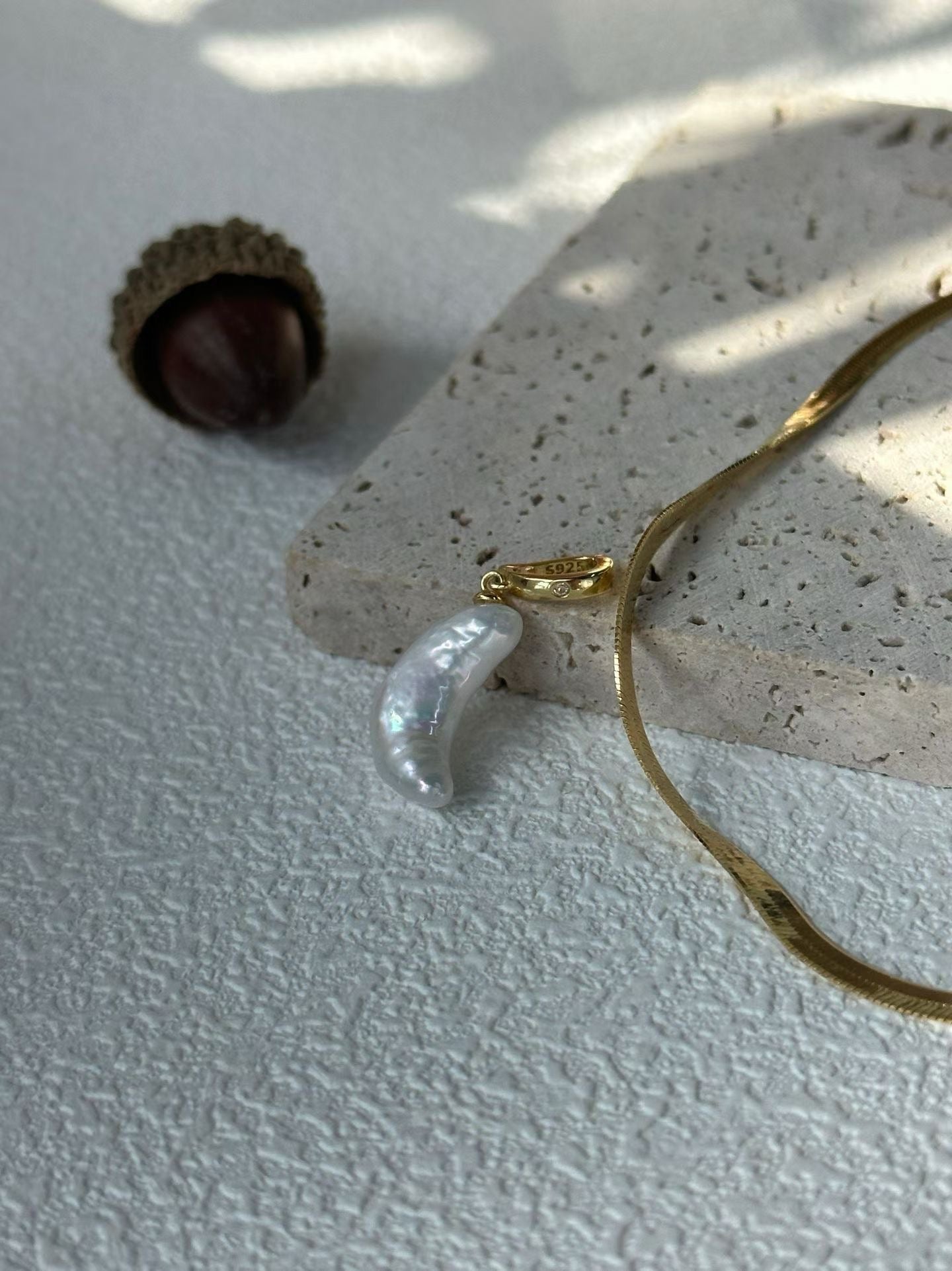 Herringbone chain necklace with moon pendant