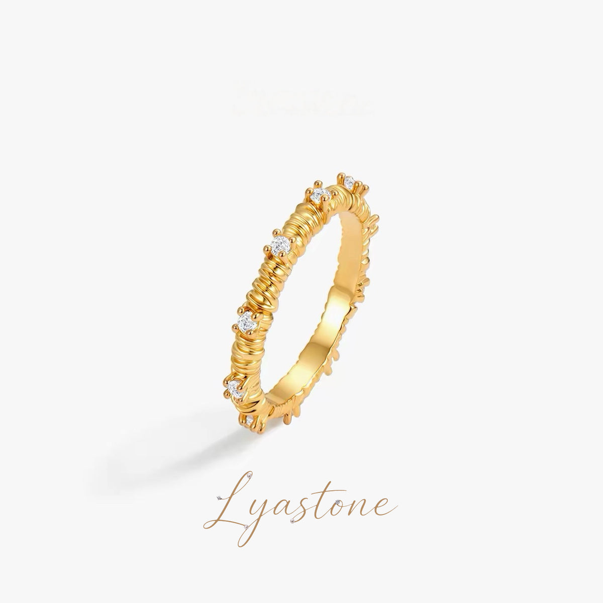 Starlit Texture Ring gold-tone textured stacking ring with zircon detail