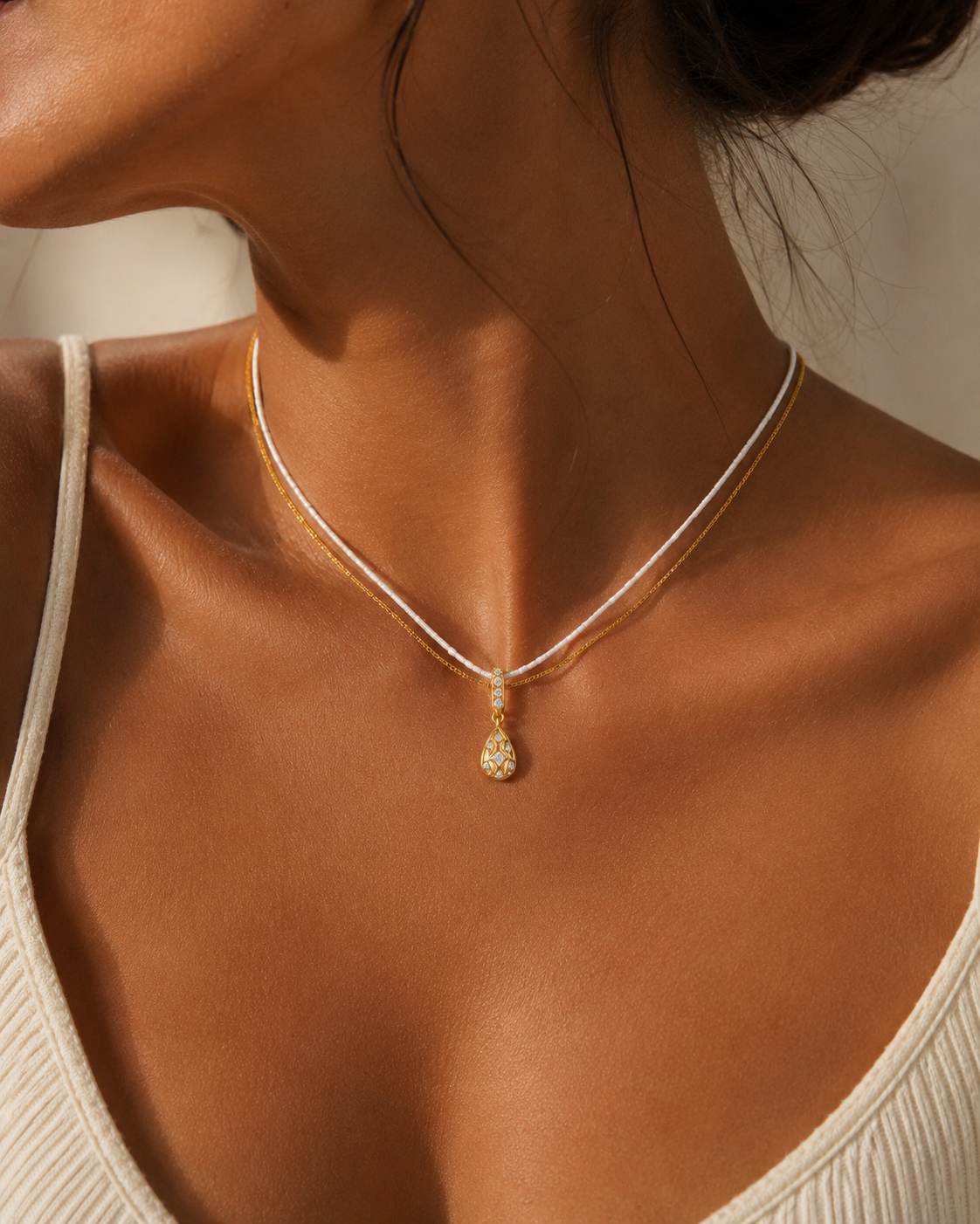 Aurelia Drop Necklace gold drop pendant close-up