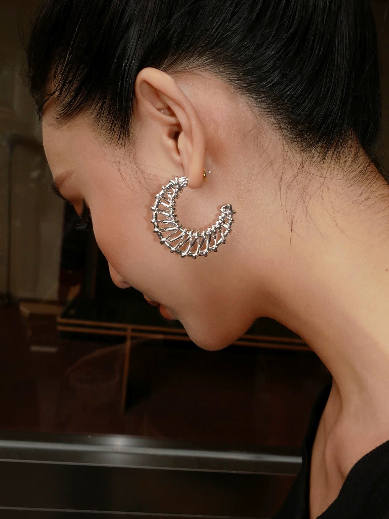 Large woven metal earrings