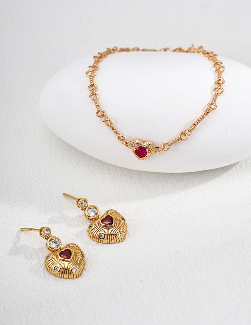 Red zircon heart bracelet in sterling silver