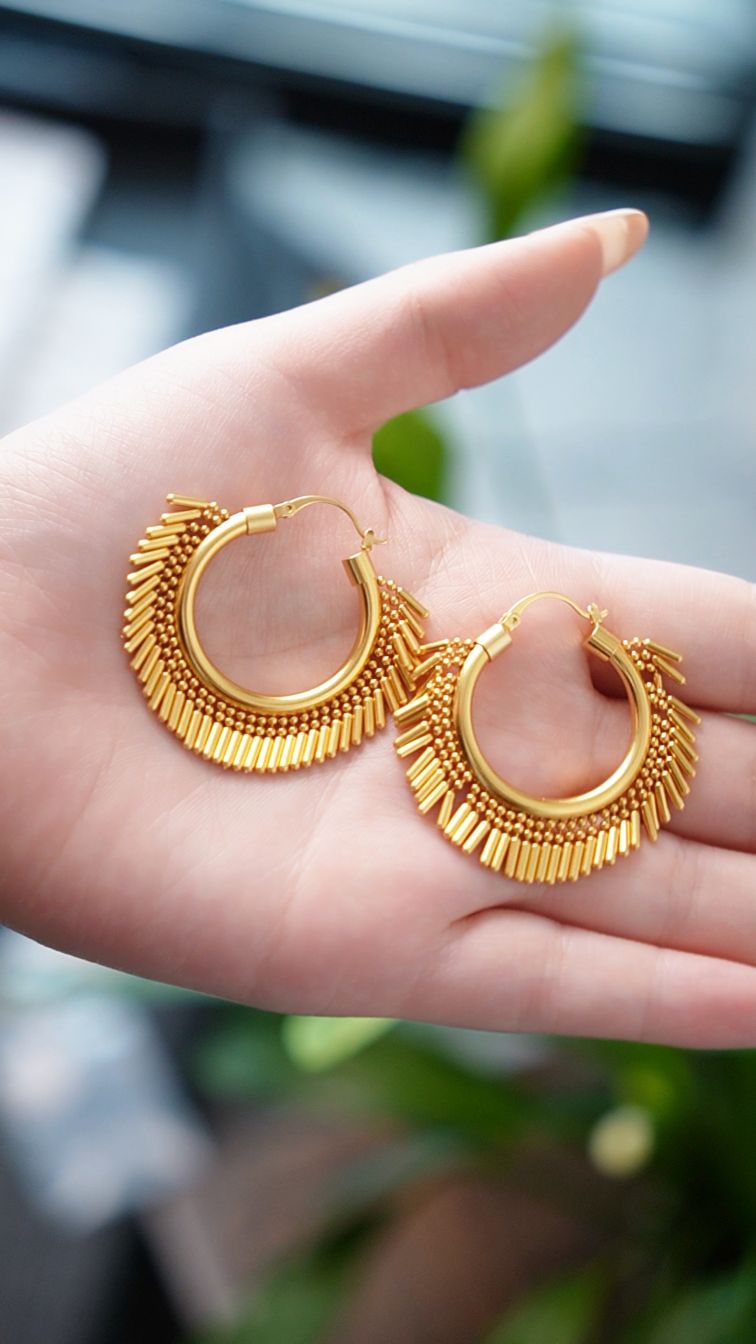 Sculptural gold hoop earrings
