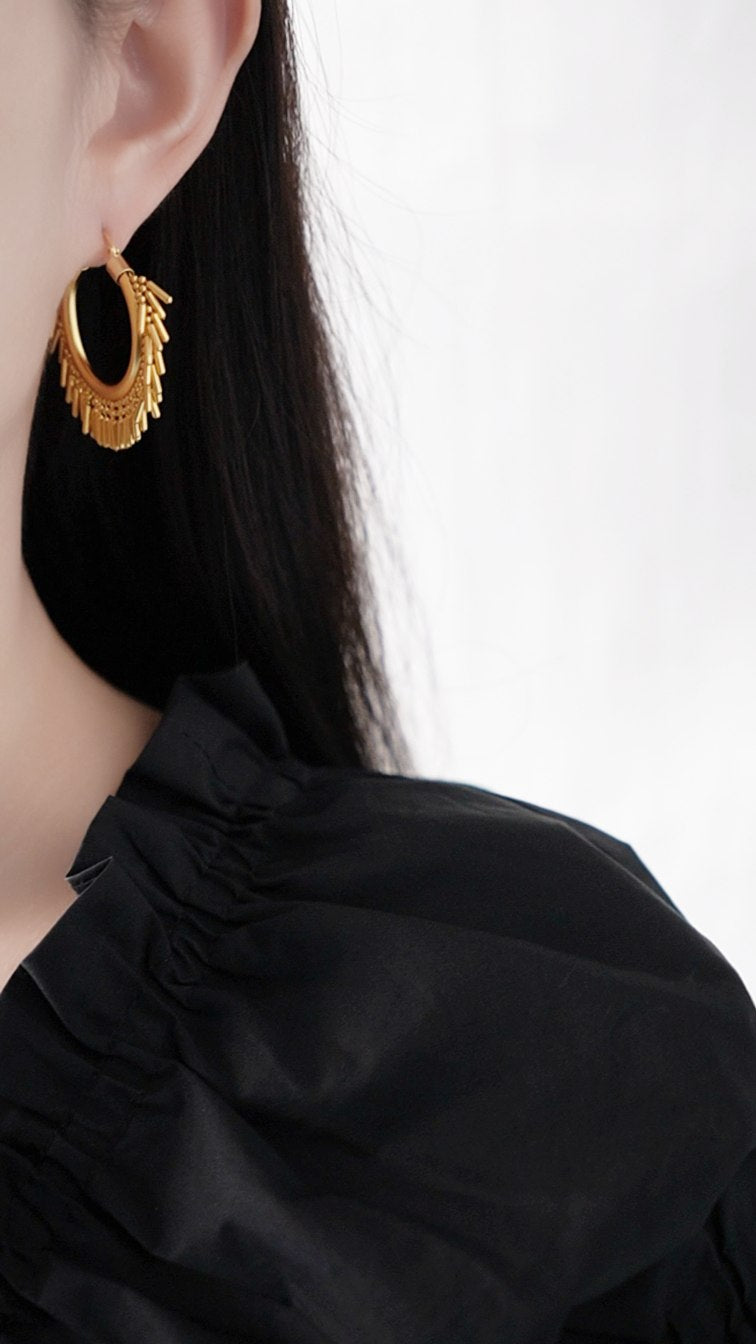 Textured brass hoop earrings in gold