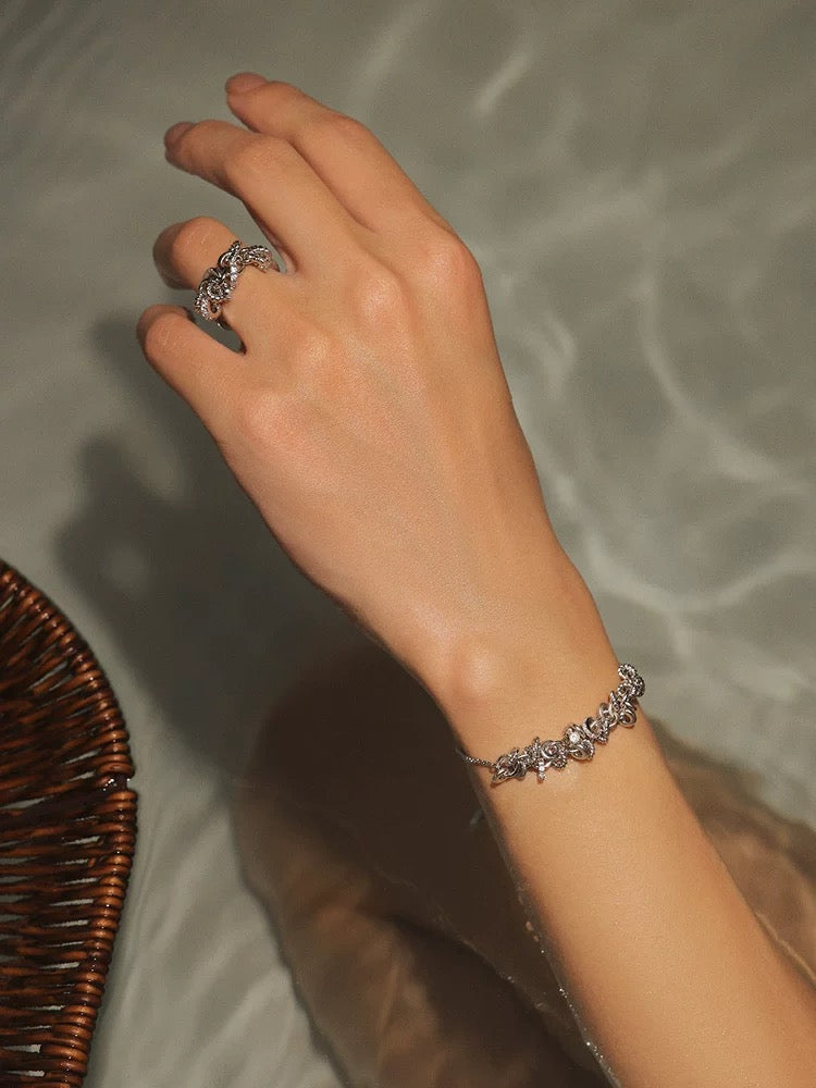 Textured disc bracelet in gold
