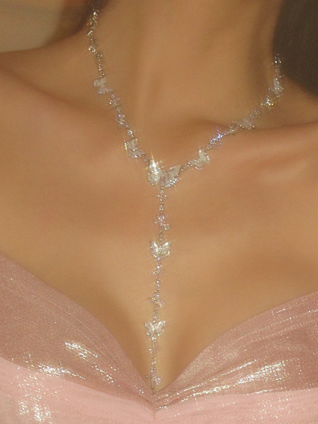 White butterfly necklace with cubic zirconia