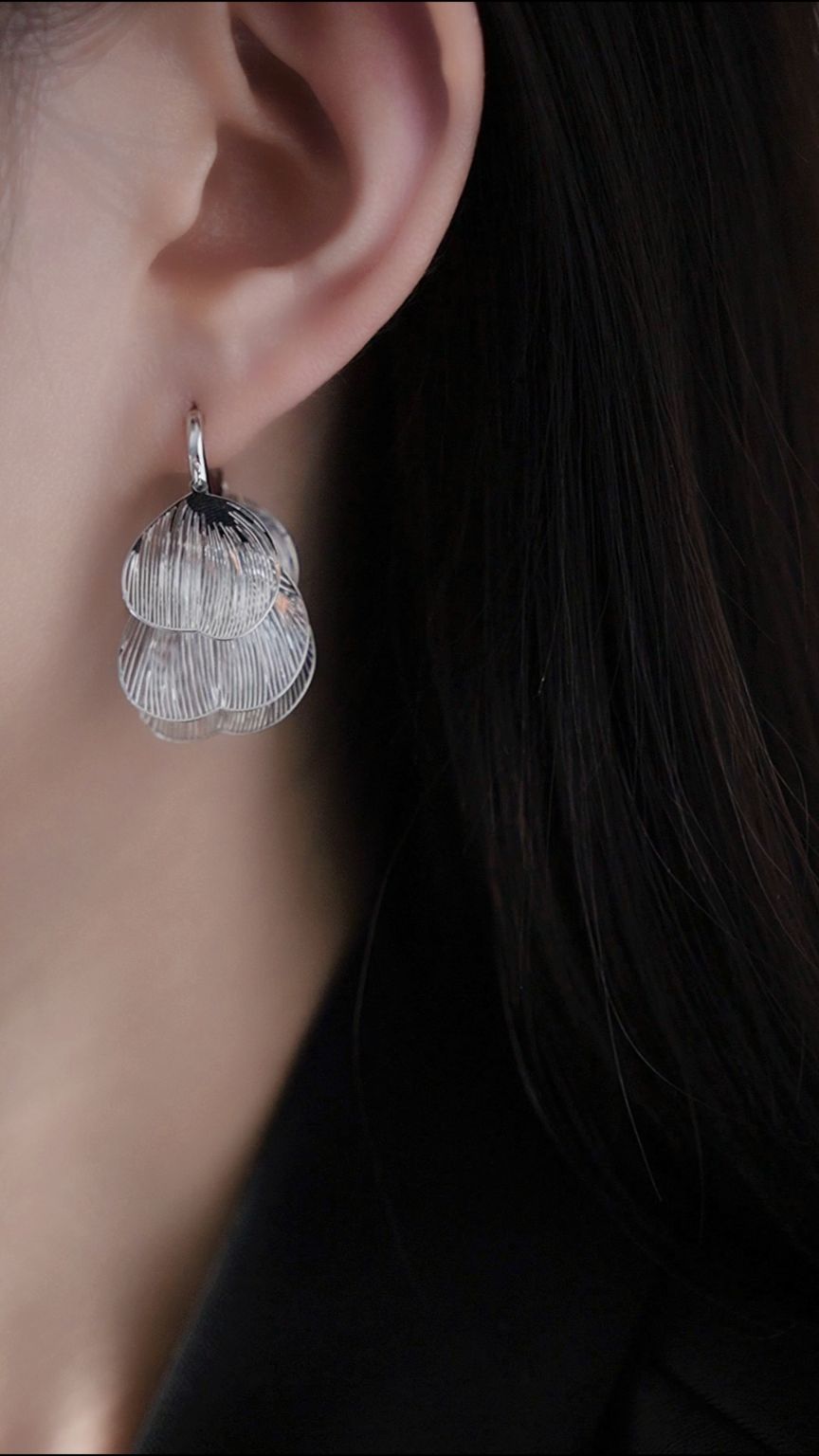 White gold petal drop earrings
