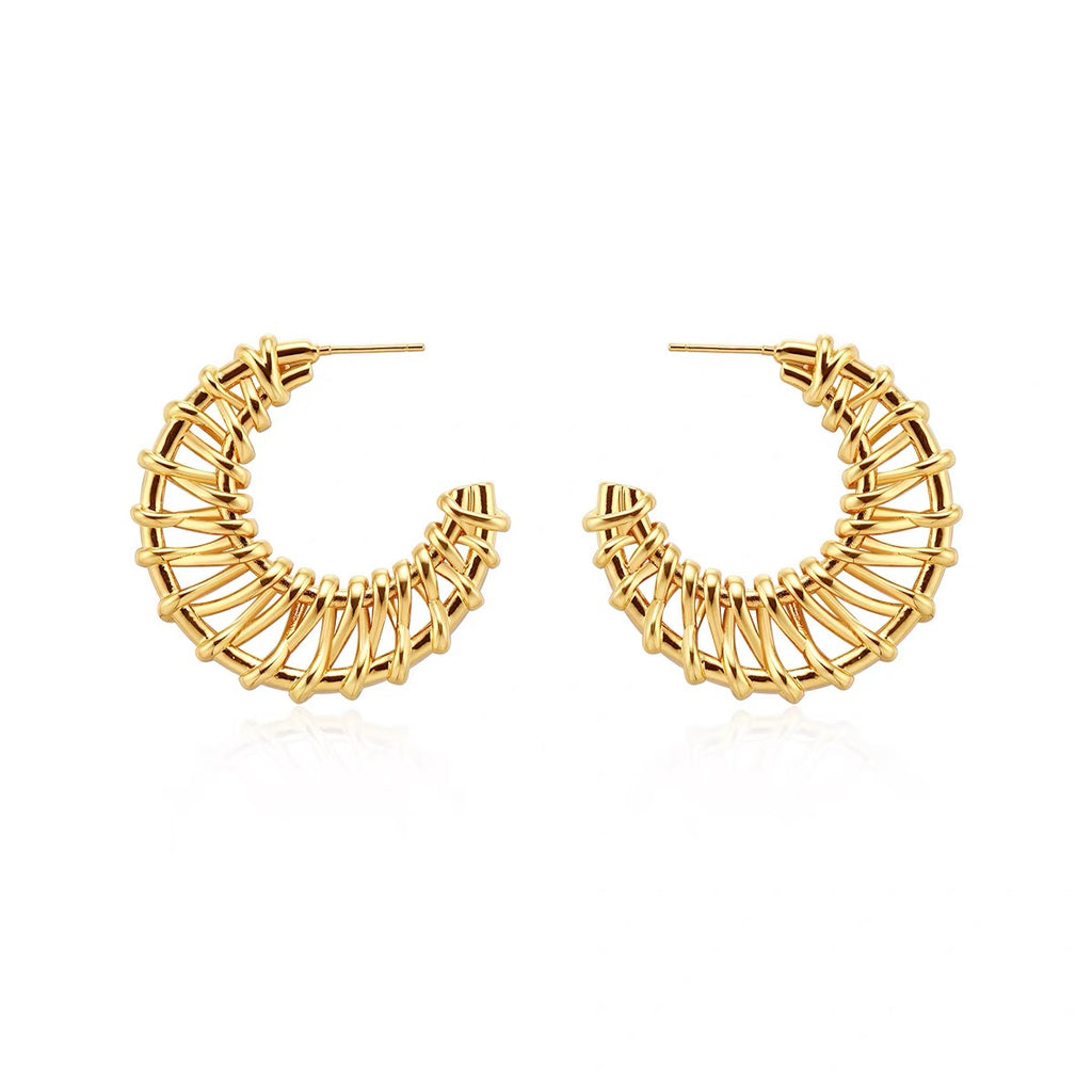 Woven statement earrings in gold