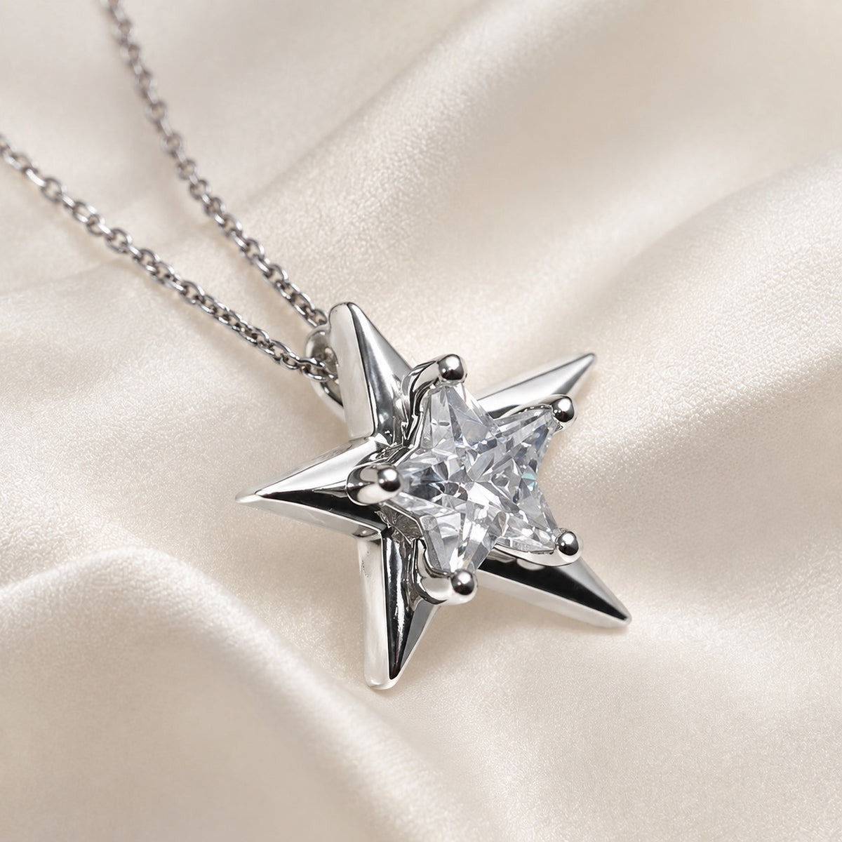 Close-up detail of Astra Star Necklace with star-cut cubic zirconia