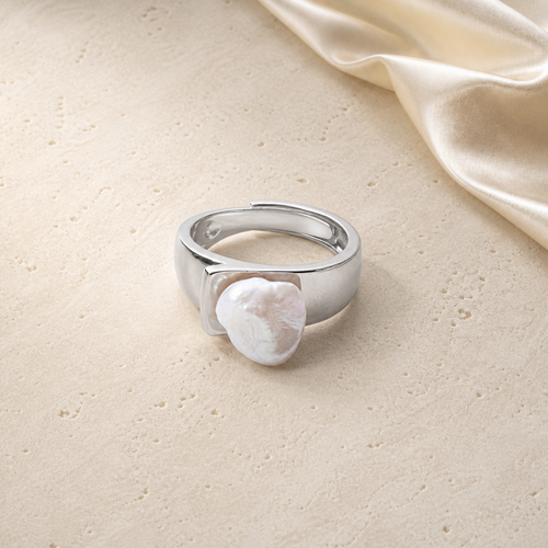 Baroque Pearl Ring on warm ivory travertine