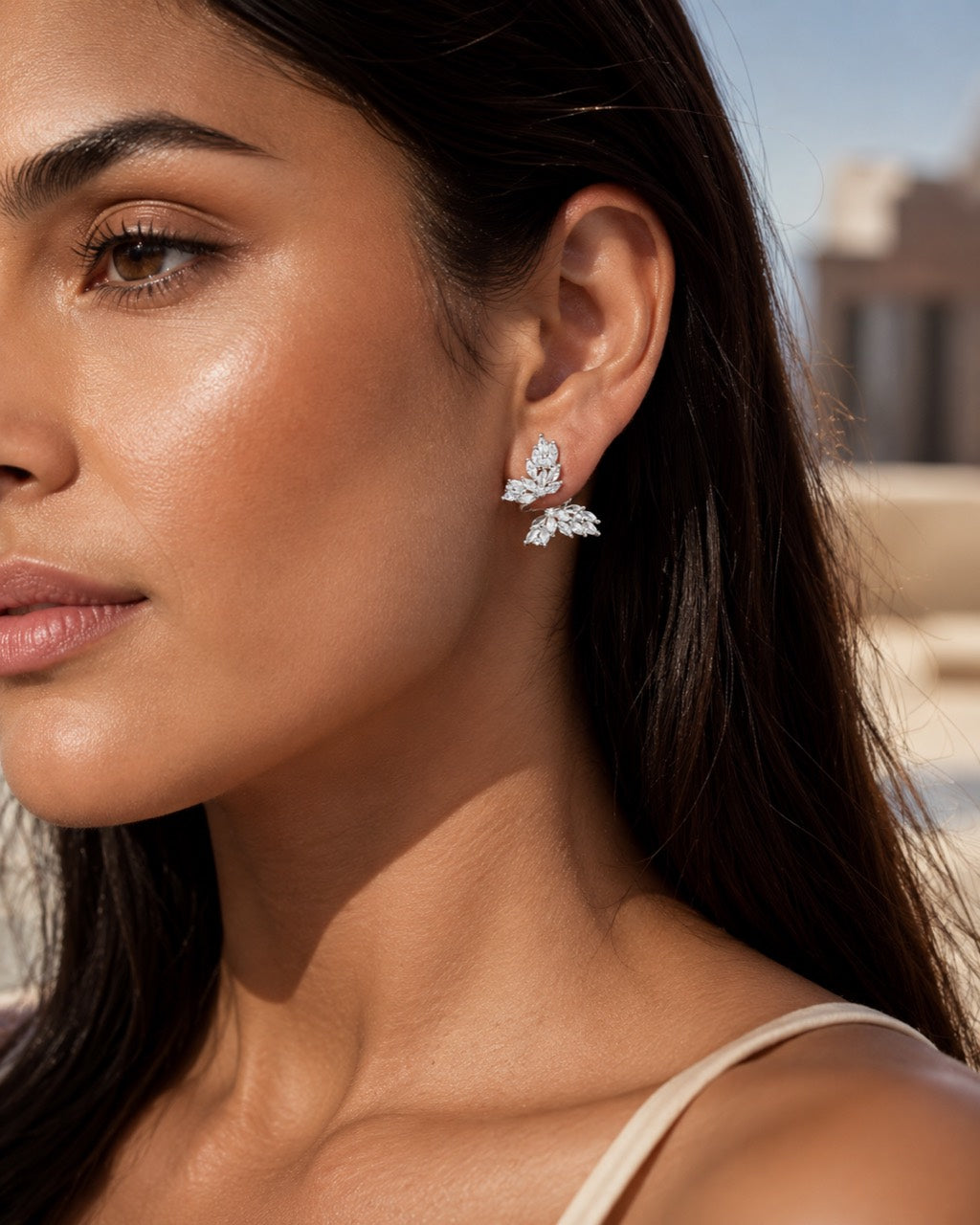 Close-up model wearing Lyastone butterfly zircon earrings