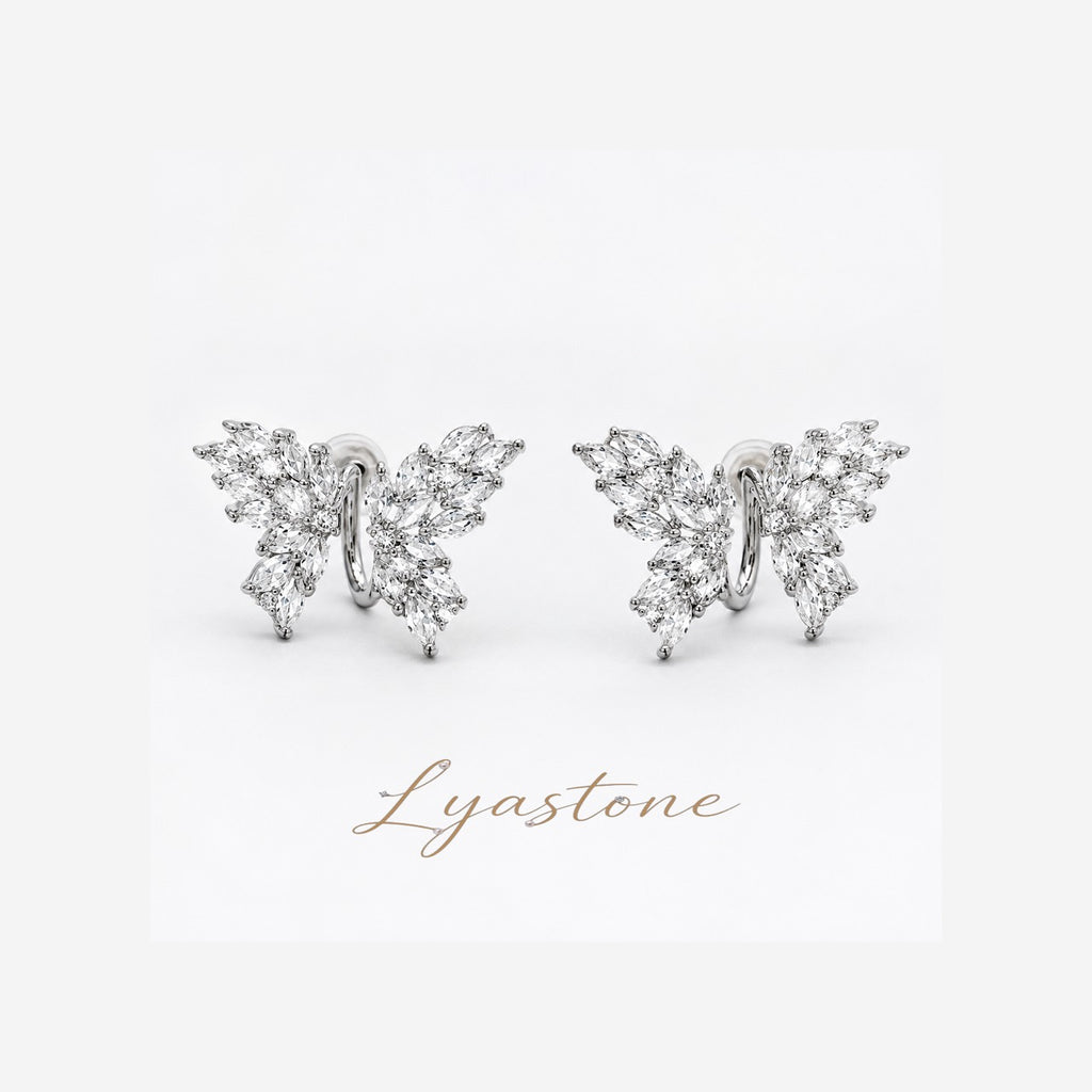 Lyastone butterfly zircon stud earrings in white-gold tone