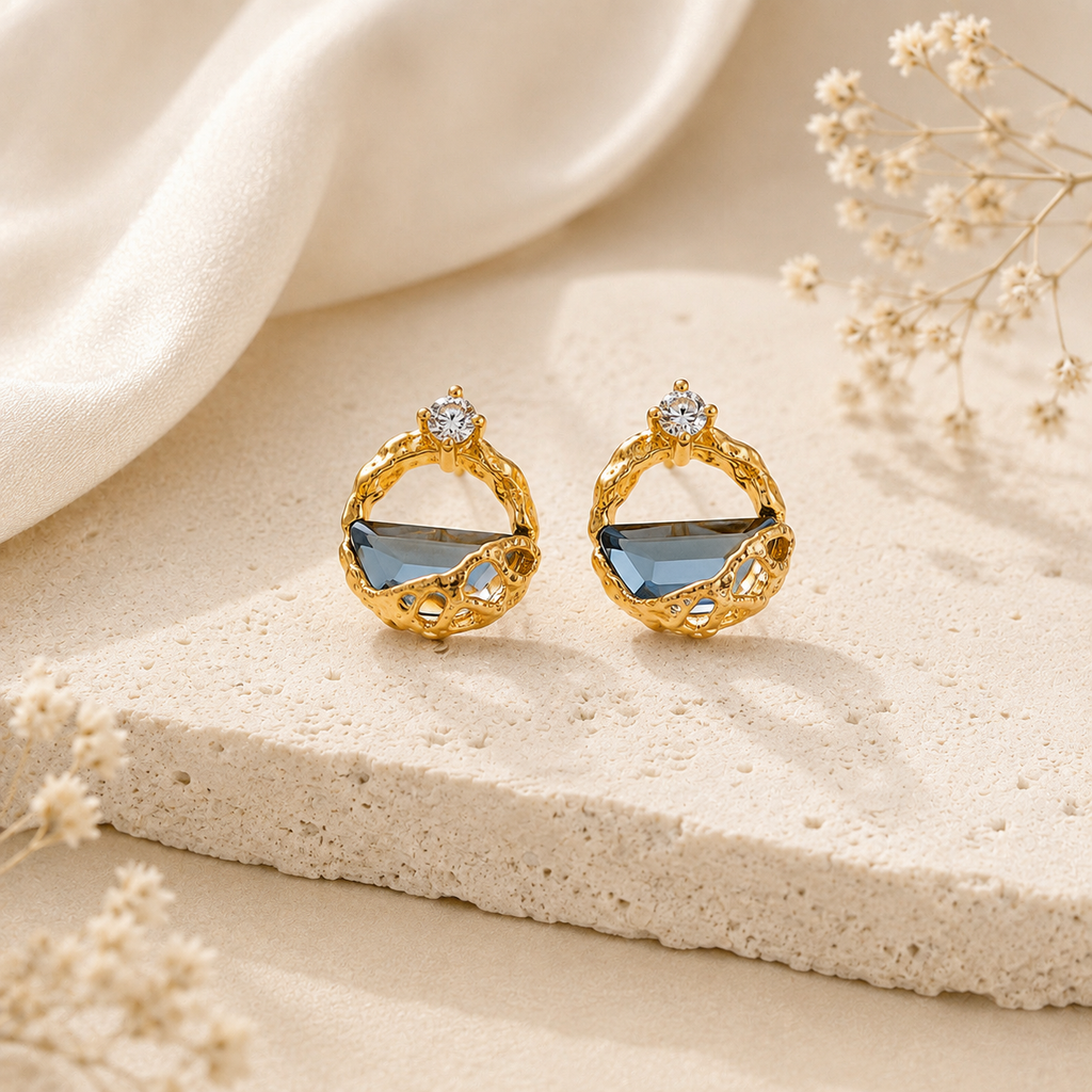 Celeste Blue Crystal Earrings on warm travertine with ivory silk and dried flowers