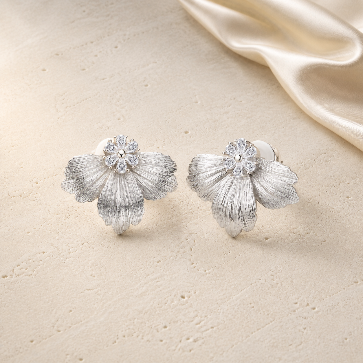 Graceful Earrings on warm ivory travertine