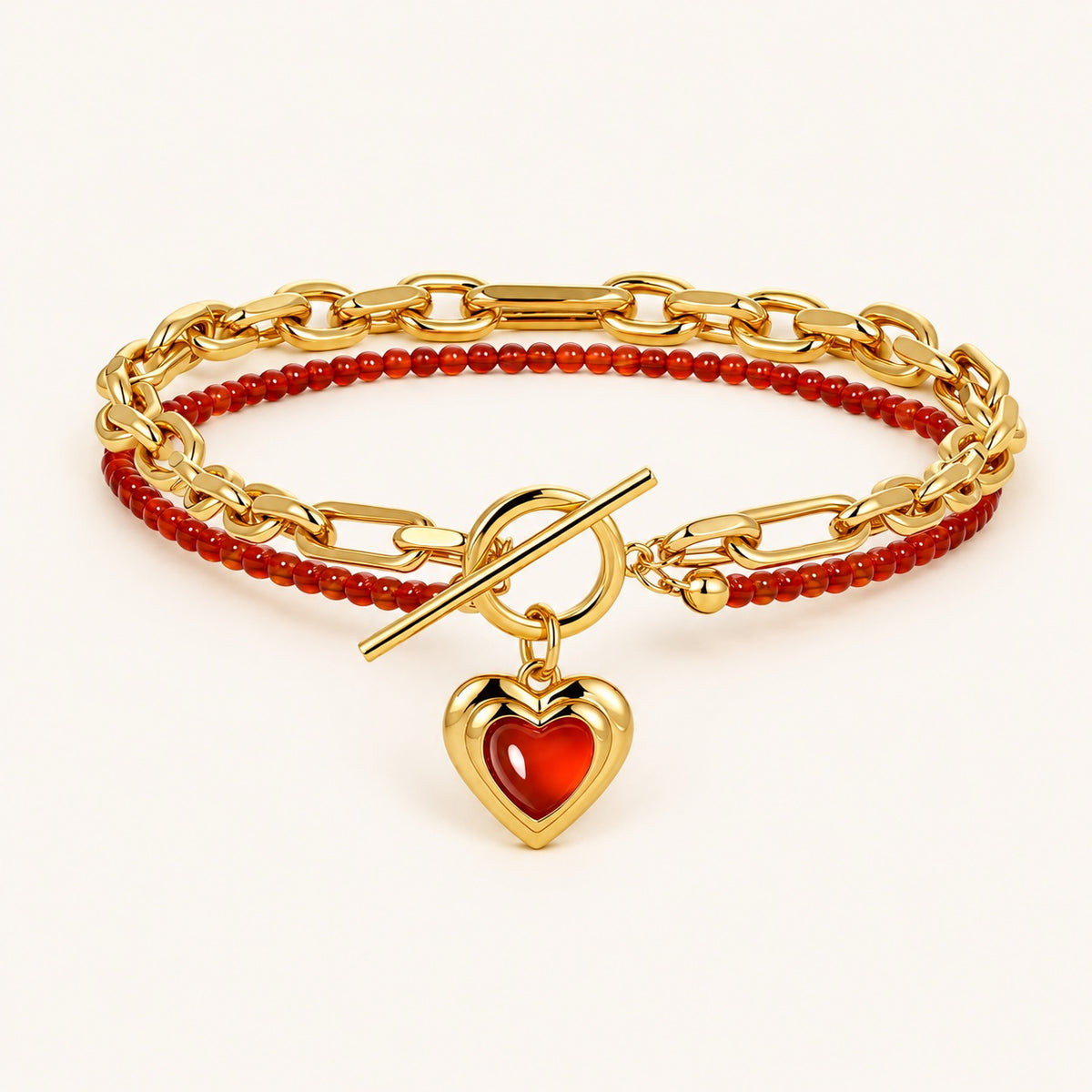 Gold-tone Amoura Heart Toggle Bracelet with red agate beads