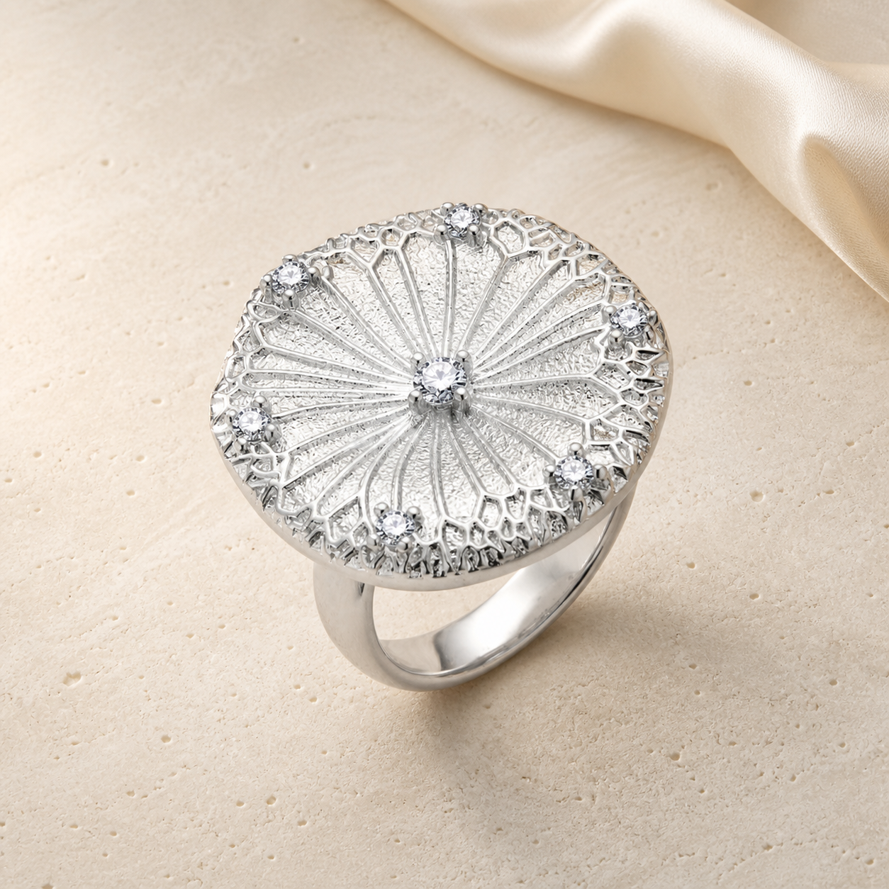 Lovegrass Ring on warm ivory travertine