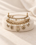 Lyastone Époque pearl charm bracelet in antique gold with layered pearls and crystal details