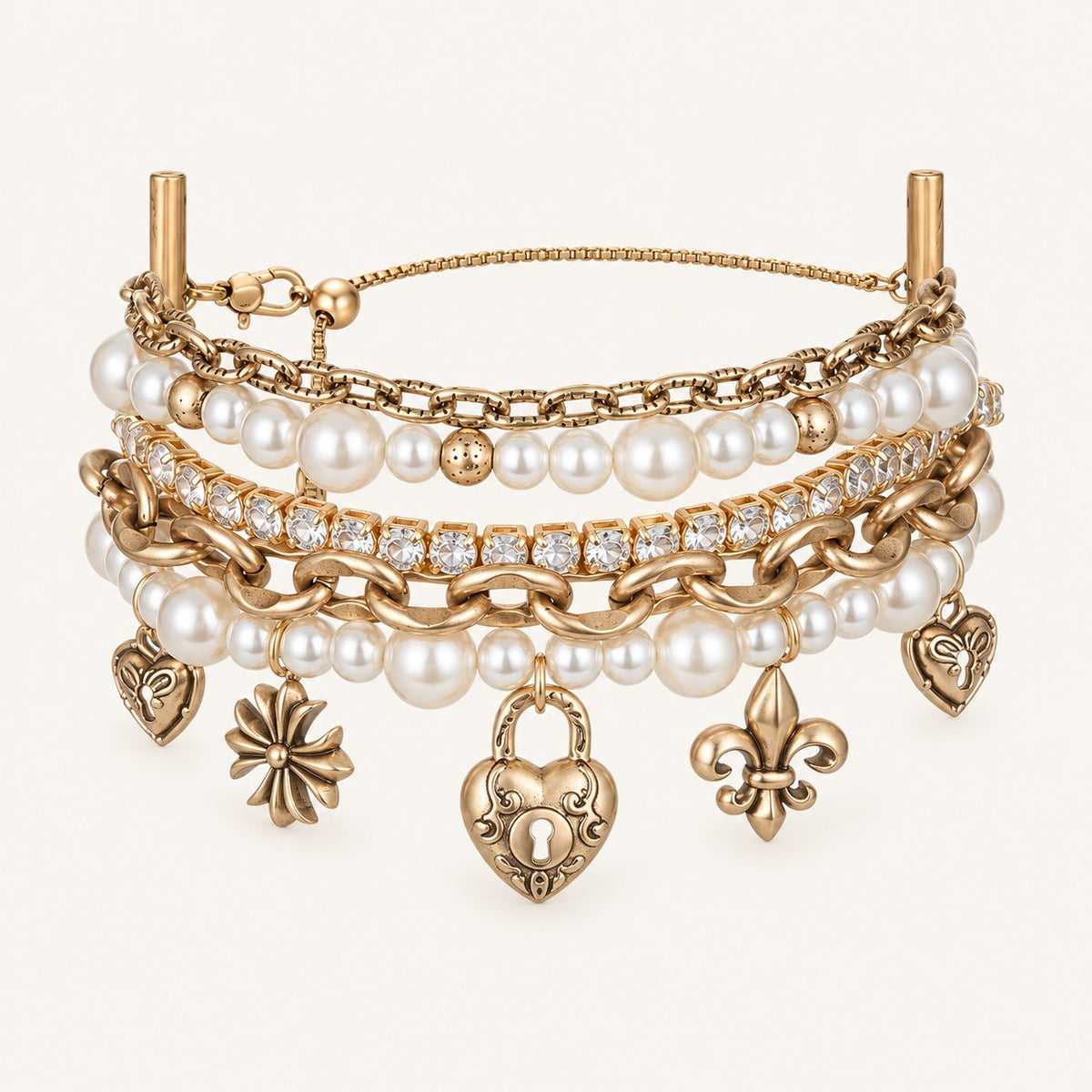 Époque layered pearl charm bracelet front view with heart lock and fleur-de-lis charms
