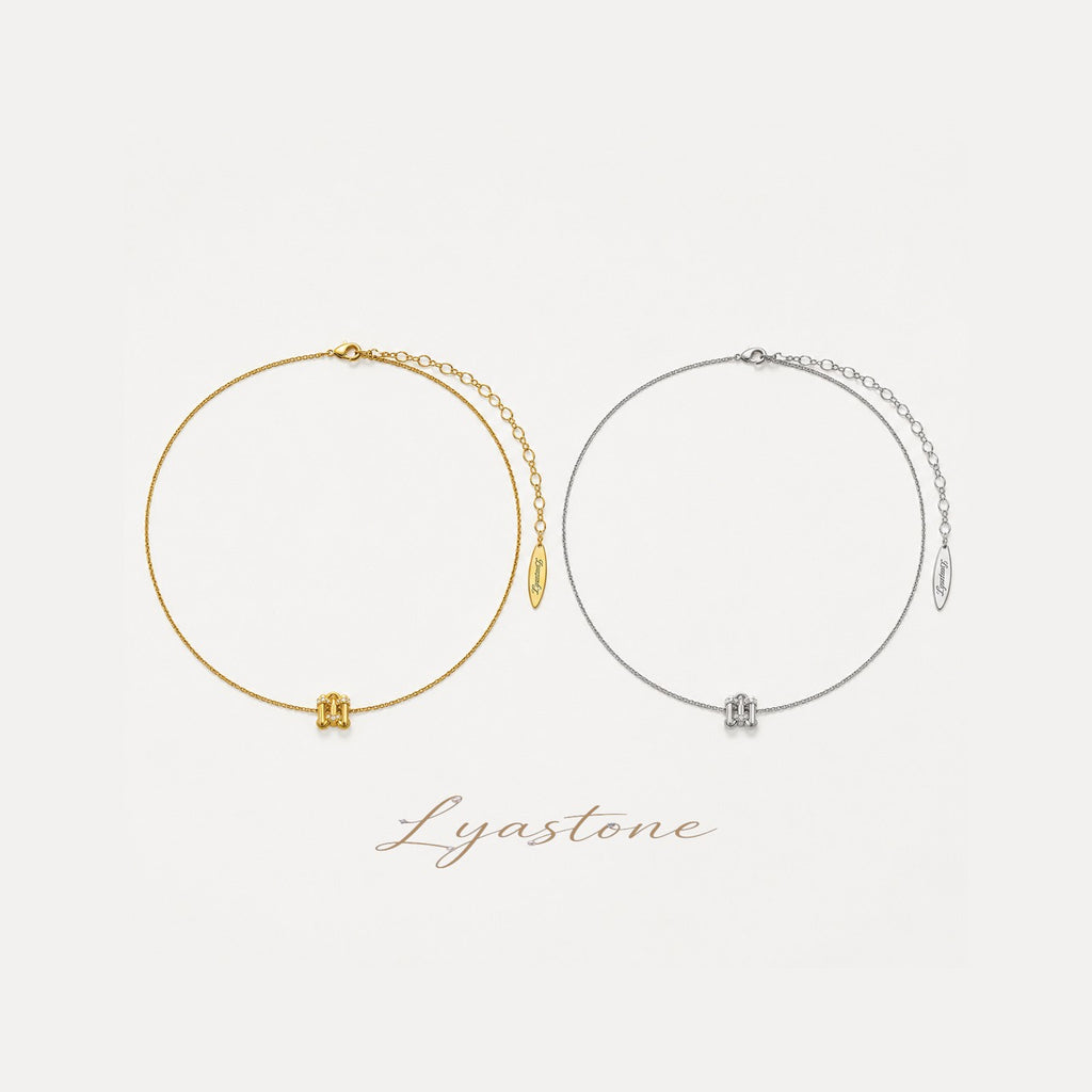 Eternal Link Necklace in gold and silver tone with cubic zirconia by Lyastone