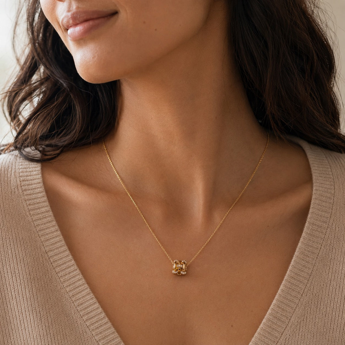 Eternal Link Necklace in gold tone styled on model