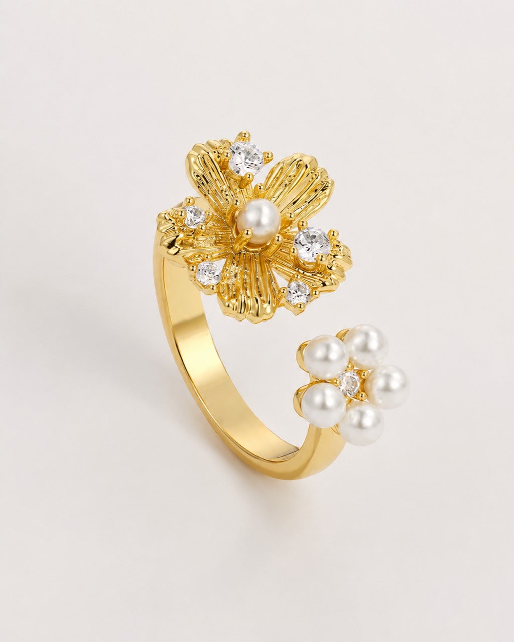 Golden Bloom Pearl Ring with textured gold flower and pearls by Lyastone
