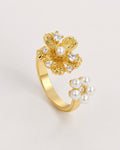 Golden Bloom Pearl Ring with textured gold flower and pearls by Lyastone