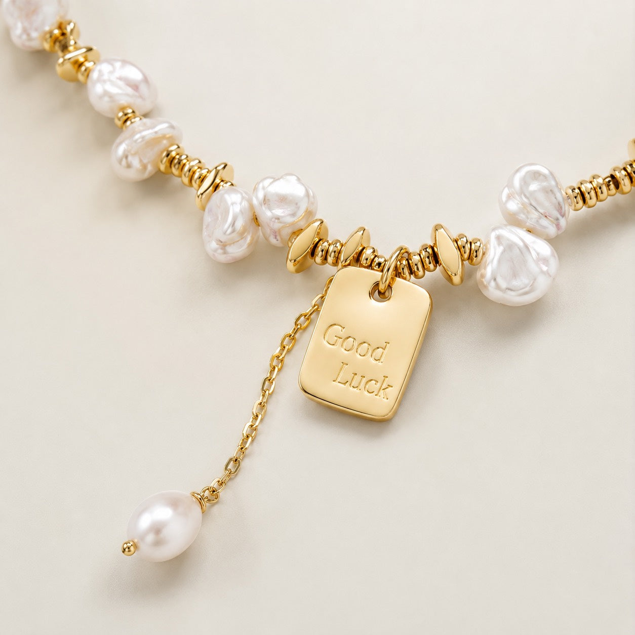 Good Luck charm and baroque pearl detail on Lyastone necklace