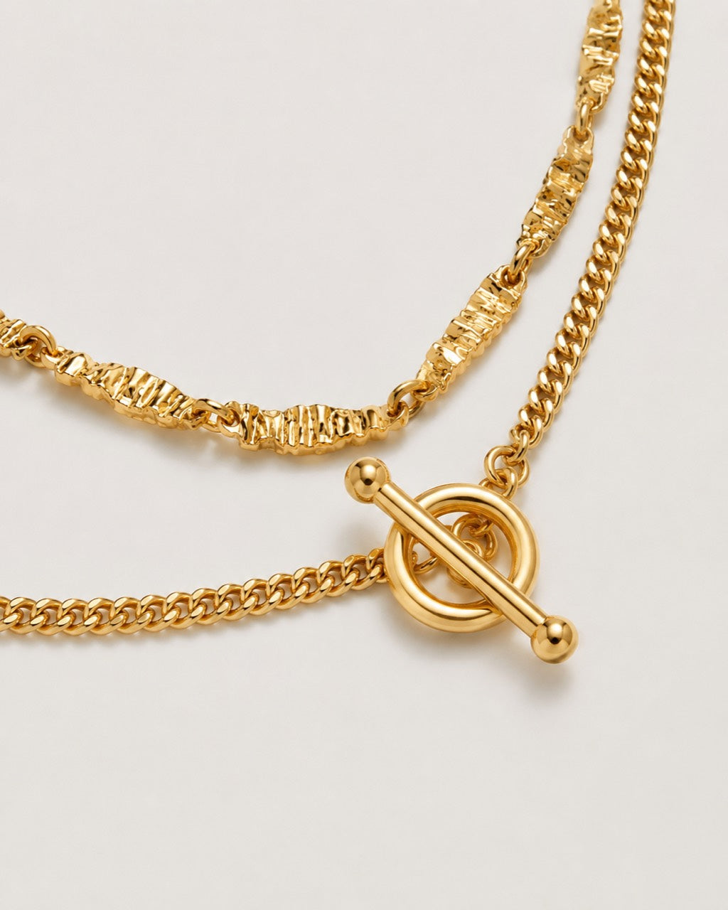 Close up of the OT toggle clasp and textured chain on Imperfect Bloom Long Necklace