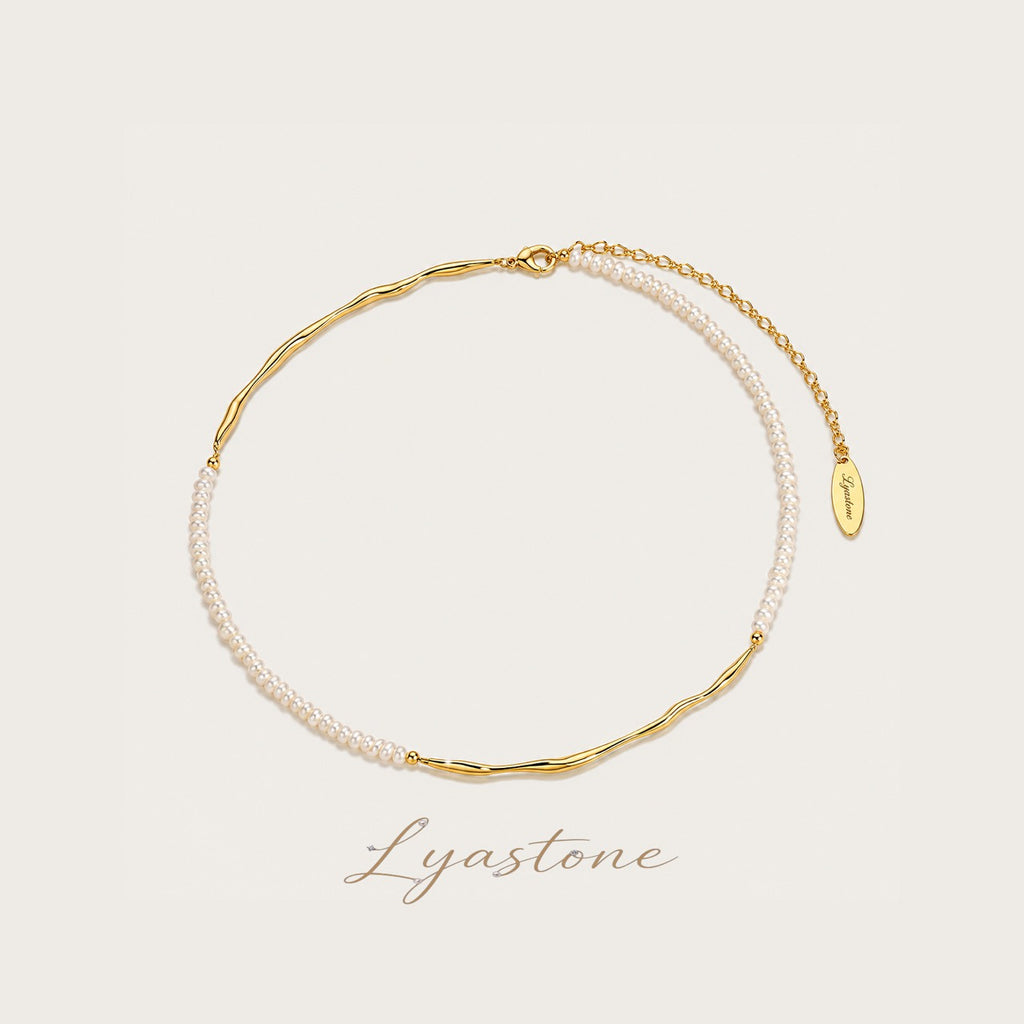 Imperfect Bloom Pearl Necklace with freshwater pearls and gold-tone flowing texture by Lyastone