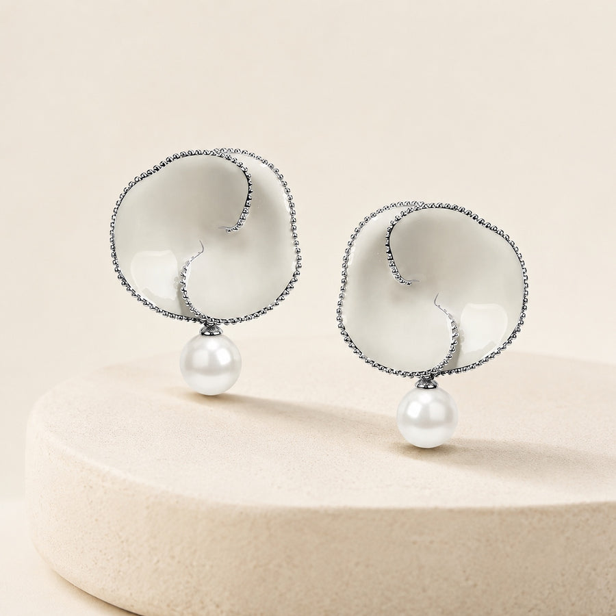 Nacre Bloom Earrings styled on warm ivory stone
