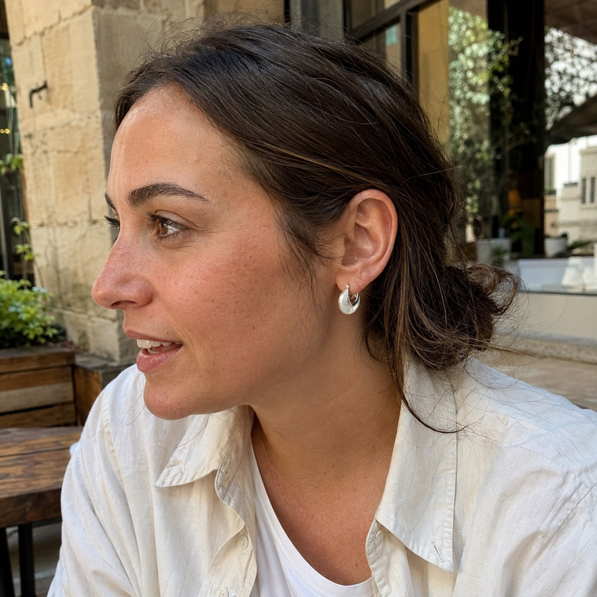 Model wearing Small Nacre Disc Hoop Earrings