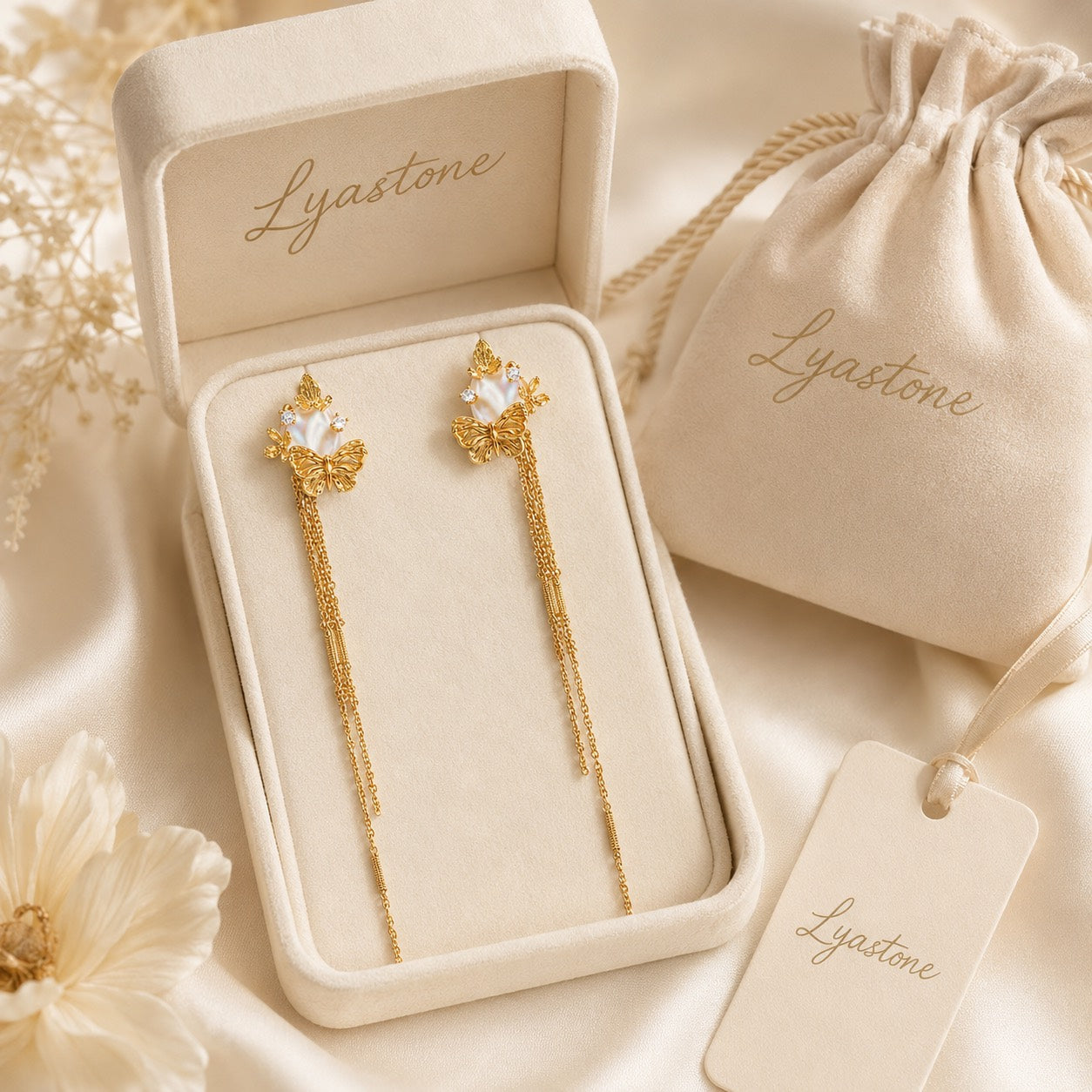 Sunlit Tide Butterfly Pearl Chain Earrings displayed in Lyastone gift packaging
