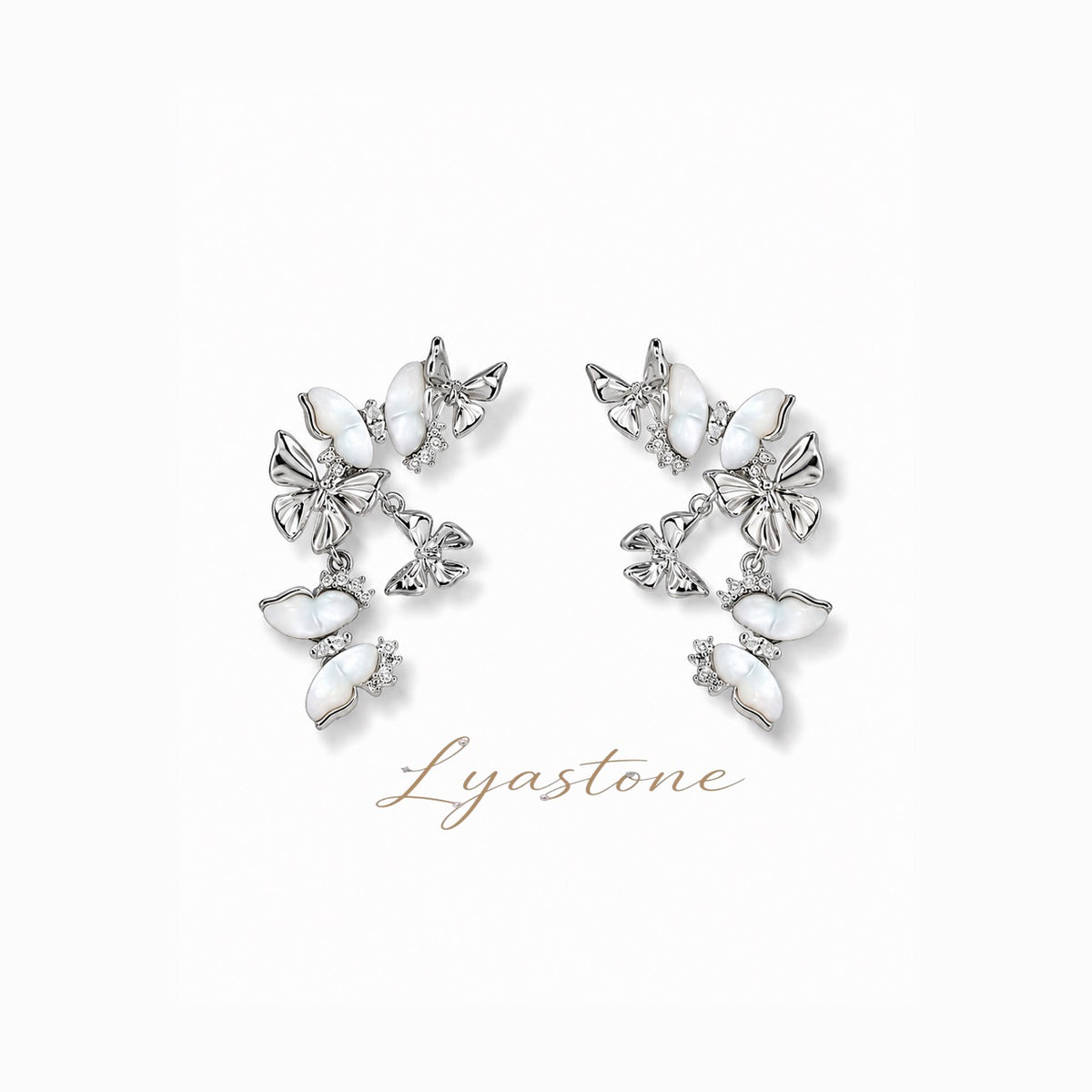 White mother of pearl butterfly drop earrings in silver tone by Lyastone