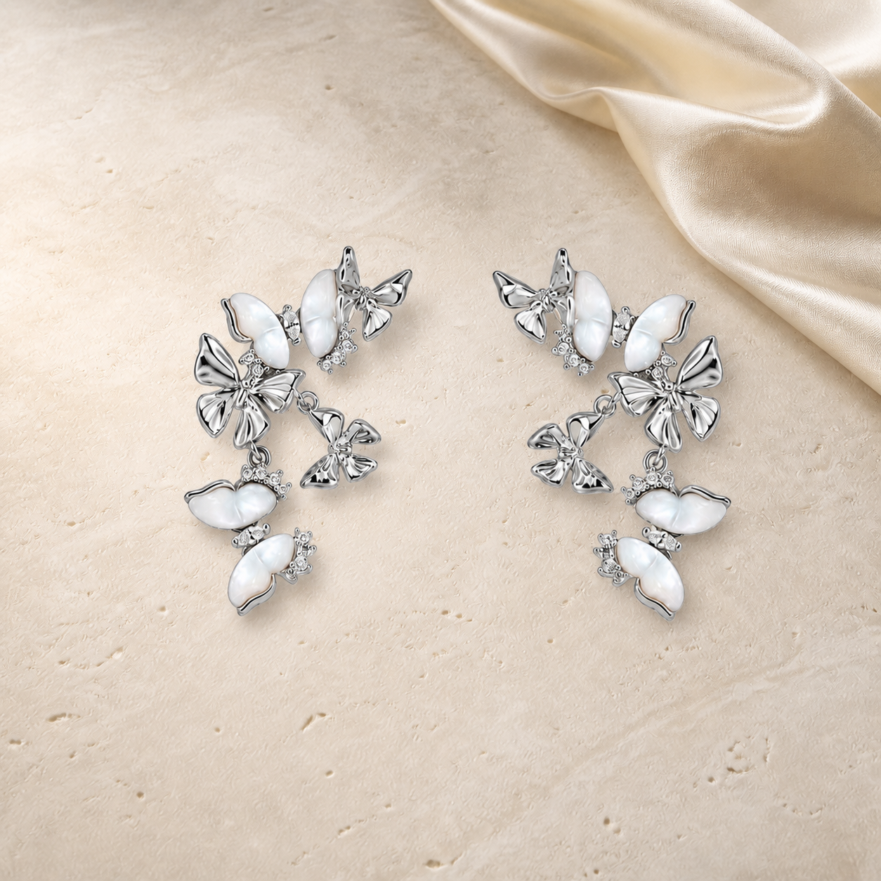 Moonveil Butterfly Drop Earrings in silver and mother of pearl