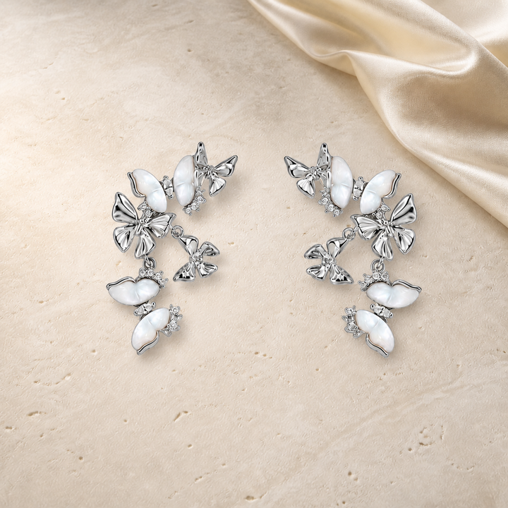 Moonveil Butterfly Drop Earrings in silver and mother of pearl