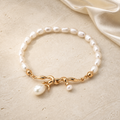 Natural Freshwater Pearl Bracelet on warm ivory travertine