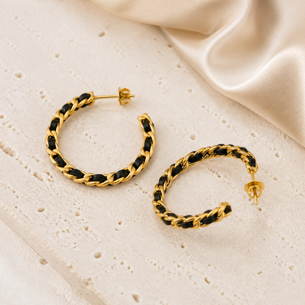 Noir Weave black and gold-tone hoop earrings with woven chain detail