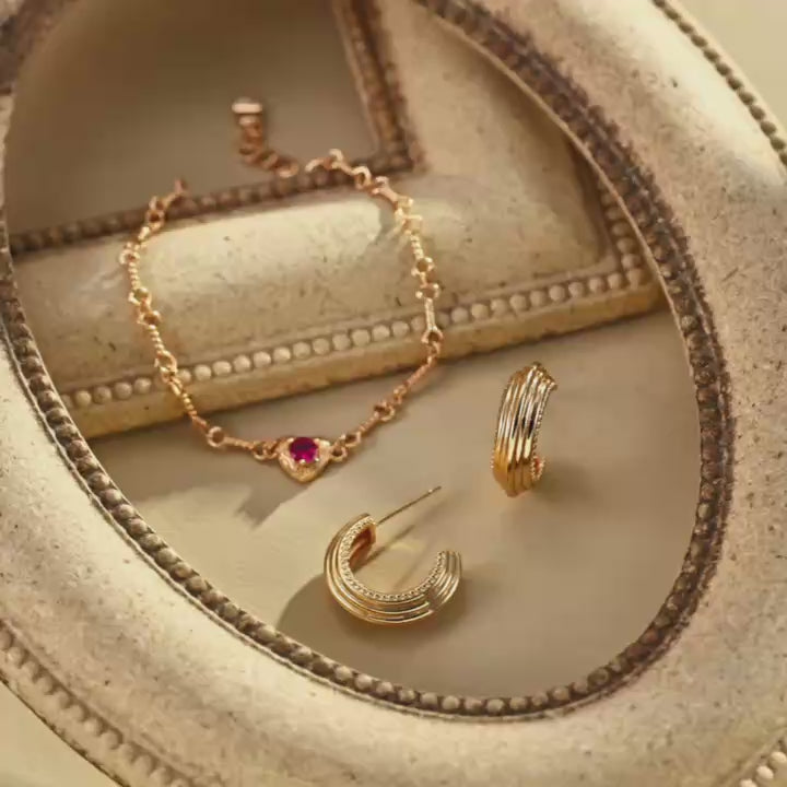 Red zircon heart bracelet in sterling silver