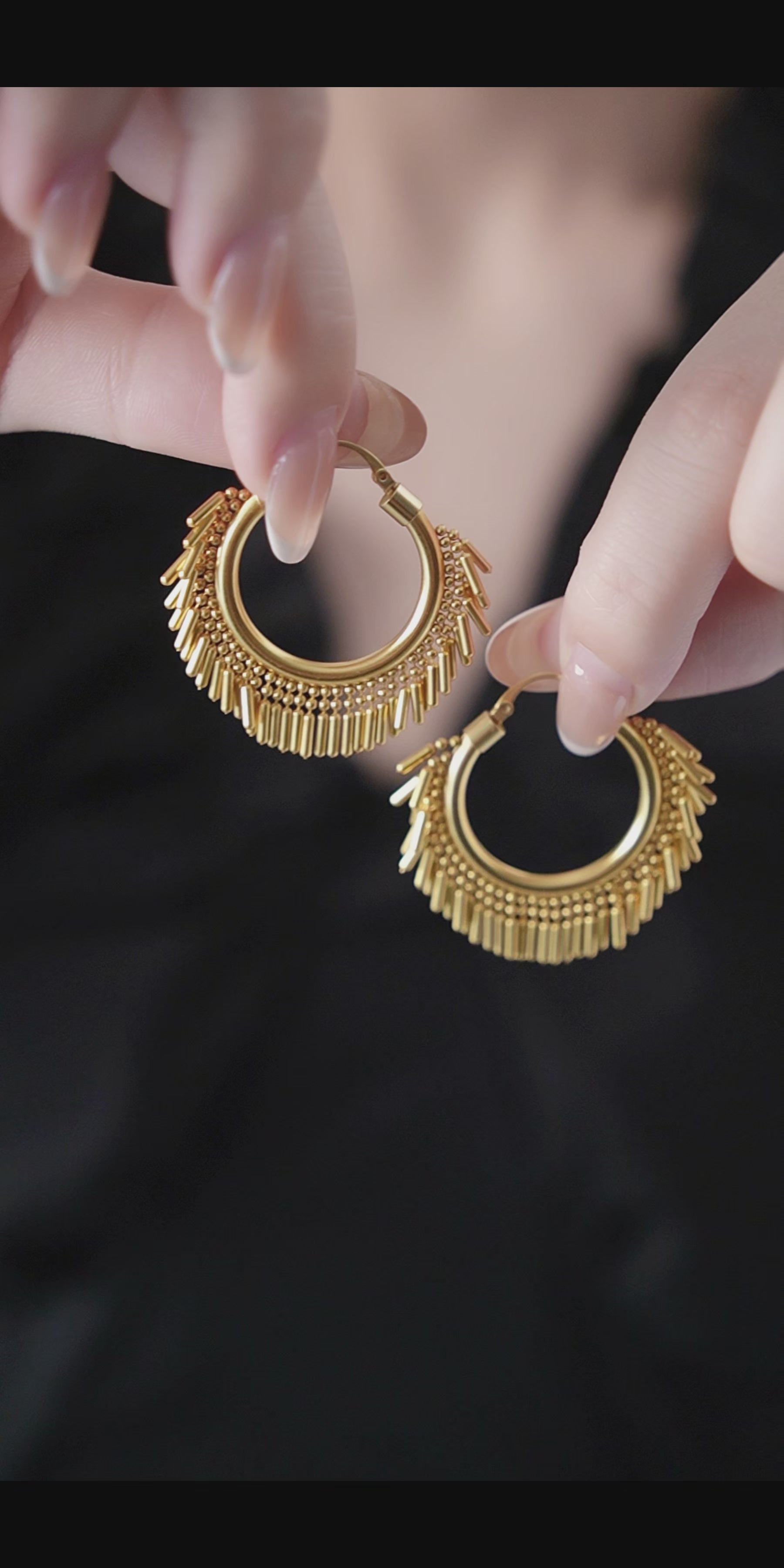 Sculptural gold hoop earrings