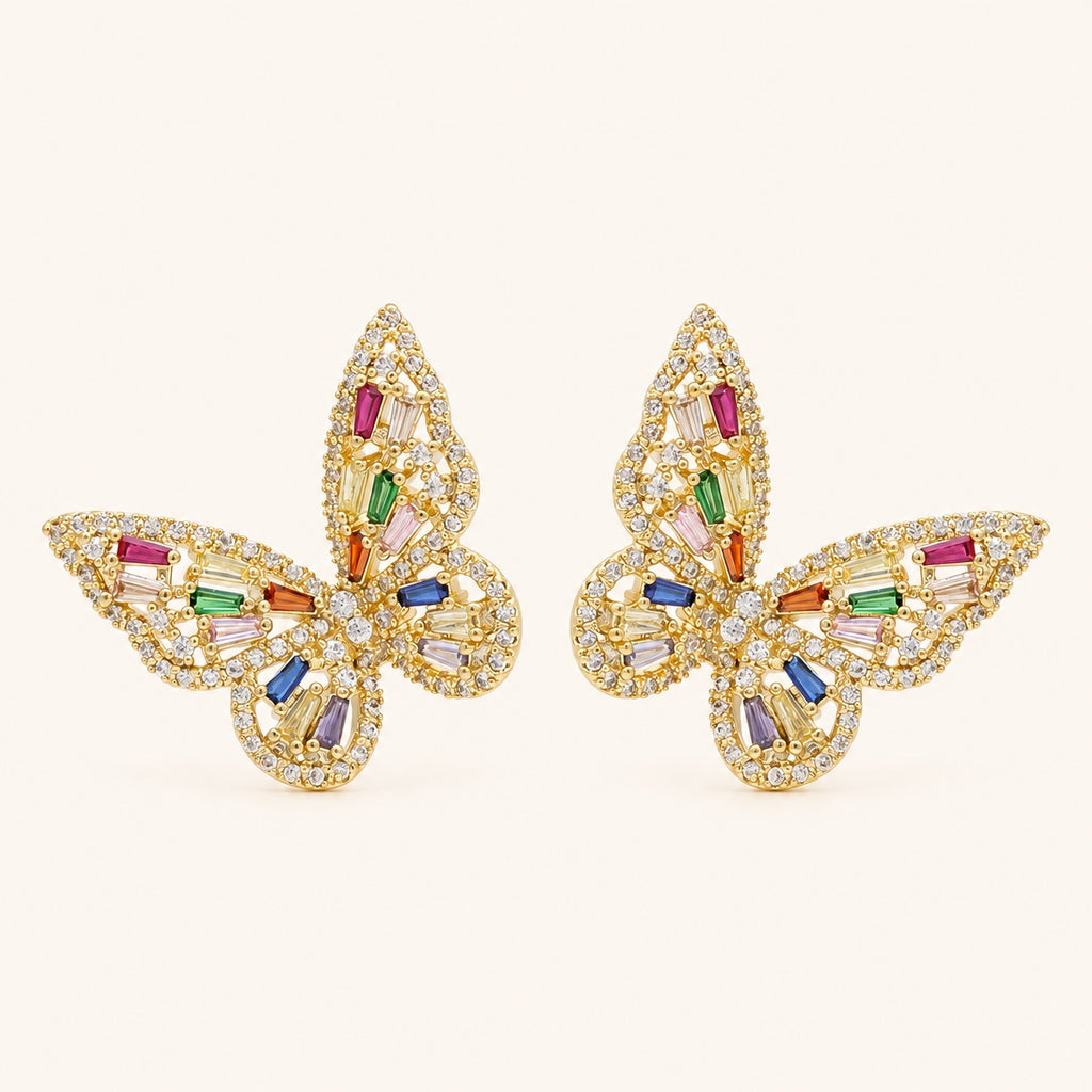 Prism Flutter Butterfly Earrings pair on a warm ivory background