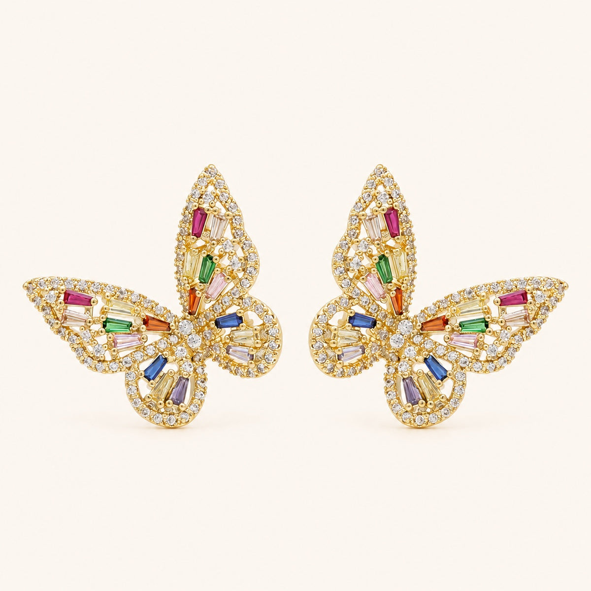 Prism Flutter Butterfly Earrings pair on a warm ivory background