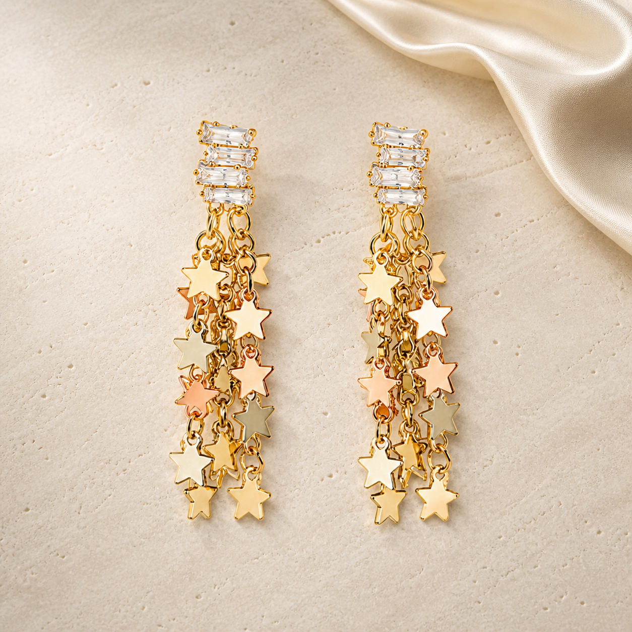 Starlight Cascade Earrings with gold star charms